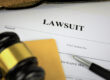 Baby Powder Pulled From Shelves in North America featured image showing a gavel on top of pending lawsuit paperwork