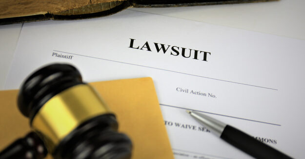 Baby Powder Pulled From Shelves in North America featured image showing a gavel on top of pending lawsuit paperwork